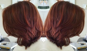 long bob haircut with dark red hair color