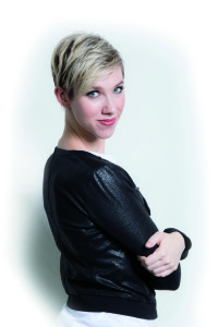 woman looking over shoulder with short haircut