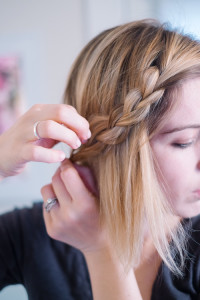 Woman putting bobby pins in hair