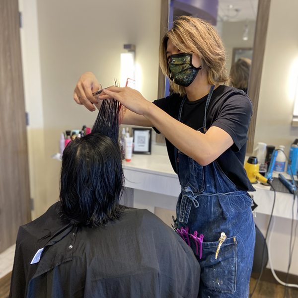 Anakin giving a customer a fresh haircut