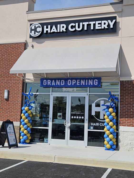 Outside of Hair Cuttery salon in Westminster with grand opening event decorations.